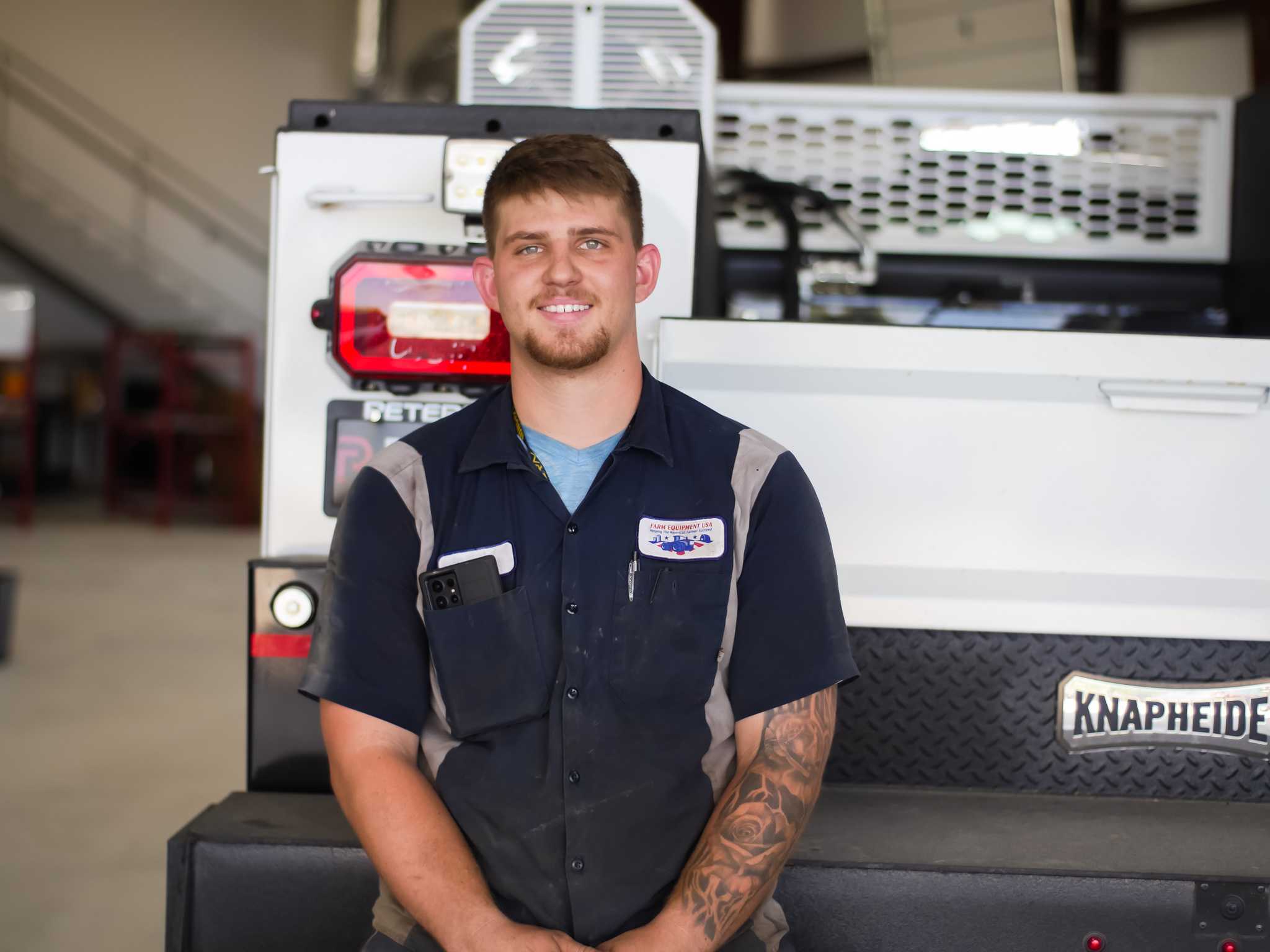 A Farm Equipment USA service mechanic